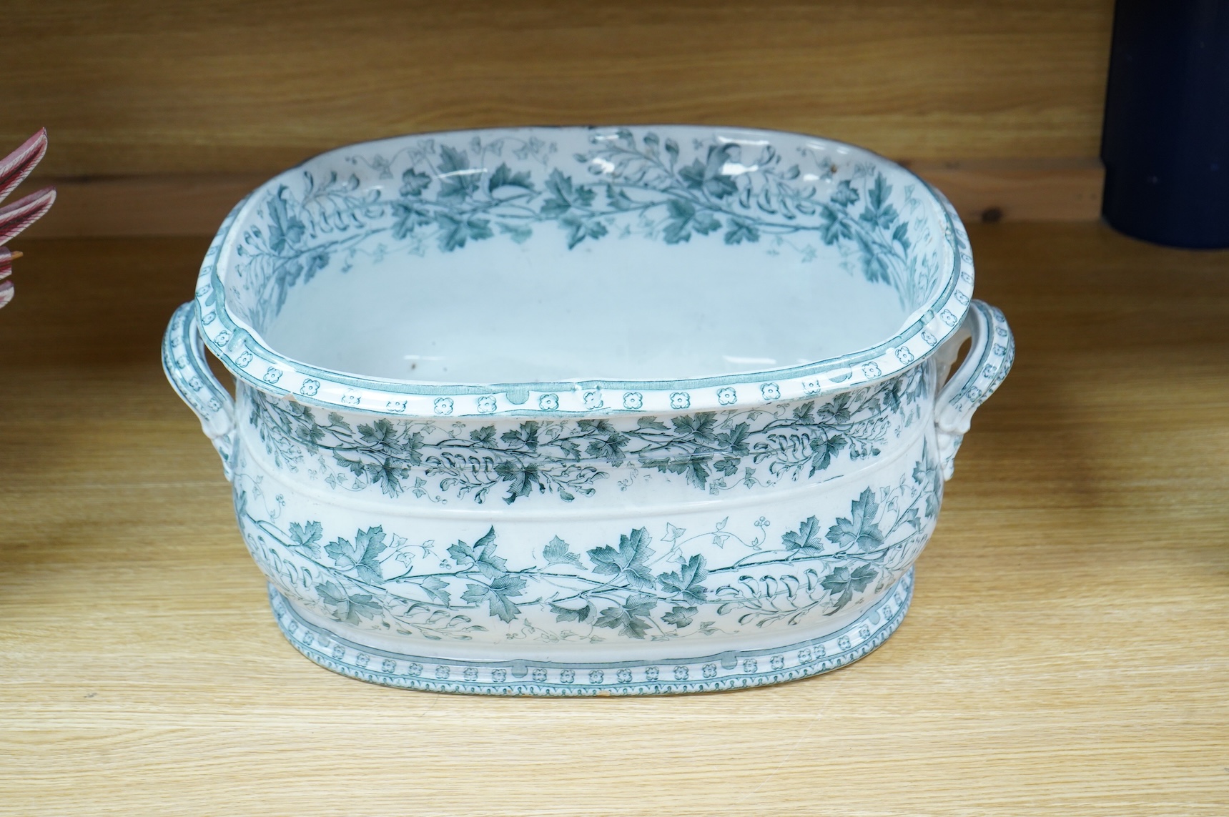 A Samuel Alcock pottery footbath, 52cm wide